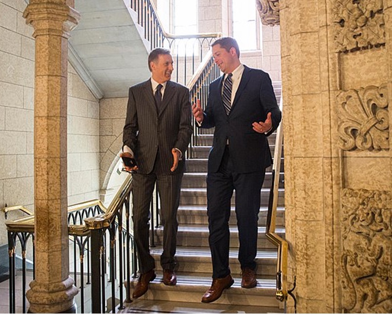 Maxime Bernier and Andrew Scheer walk the halls of Parliament - before their falling out.